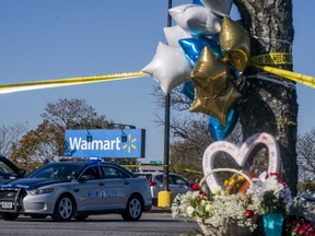 A memorial is seen at the site of a fatal shooting inside a Walmart store in Chesapeake, Va., Wednesday, Nov. 23, 2022.