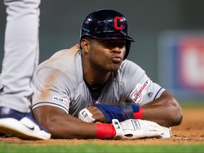 Cleveland Indians outfielder Yasiel Puig blows a kiss to the dugout in the ninth inning against Minnesota Twins at Target Field in Minneapolis on Aug. 9, 2019.
