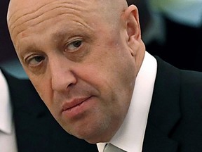 In this July 4, 2017 file photo, Russian businessman Yevgeny Prigozhin is shown prior to a meeting of Russian President Vladimir Putin and Chinese President Xi Jinping in the Kremlin in Moscow.