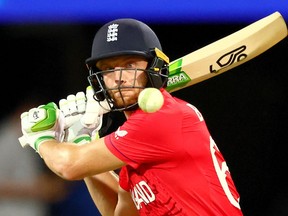 England's Captain Jos Buttler plays a shot during the ICC men's Twenty20 World Cup 2022 cricket match between England and New Zealand at The Gabba on November 1, 2022 in Brisbane.