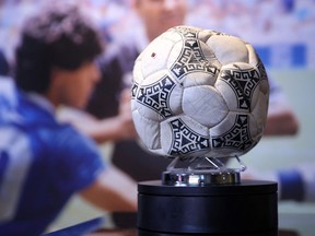 The match ball used in the 1986 FIFA World Cup Quarter-Final football match between Argentina and England, played at the Estadio Azteca, Mexico City, is pictured during a photocall ahead of its auction, at Wembley Stadium in London on November 1, 2022.
