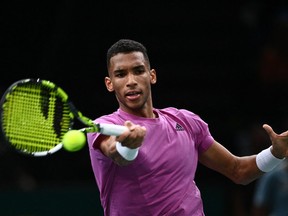 Canada's Felix Auger-Aliassime plays a forehand return during the men's singles round of 8 tennis match between France's Gilles Simon and Canada's Felix Auger-Aliassime on day four of the ATP World Tour Masters 1000 - Paris Masters (Paris Bercy) - indoor tennis tournament at The AccorHotels Arena in Paris on November 3, 2022.