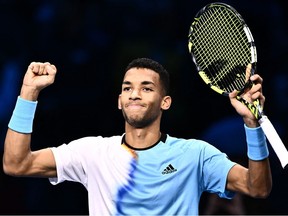 Canada's Felix Auger-Aliassime celebrates after winning his round-robin match against Spain's Rafael Nadal on November 15, 2022 at the ATP Finals tennis tournament in Turin.