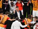Canada's English coach John Herdman speaks to his players after the Qatar 2022 World Cup Group F football match between Belgium and Canada at the Ahmad Bin Ali Stadium in Al-Rayyan, west of Doha on November 23, 2022.