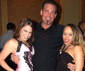 Aaron Franklin Brink, 51, aka porn star Dick Delaware, with two unidentified women in an undated photo posted to social media. AARON FRANKLIN BRINK/TWITTER