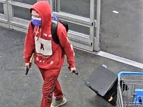 Investigators need help identifying this man who is suspected of robbing a west end store, along with an unidentified woman, and attacking an employee with an axe on Tuesday, Nov. 8, 2022.