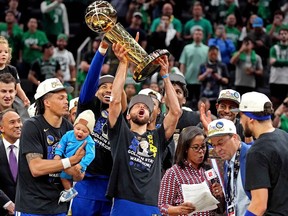 Jun 16, 2022; Boston, Massachusetts, USA; Golden State Warriors guard Stephen Curry (30) celebrates with the the Larry O'Brien Championship Trophy after the Golden State Warriors beat the Boston Celtics in game six of the 2022 NBA Finals to win the NBA Championship at TD Garden.