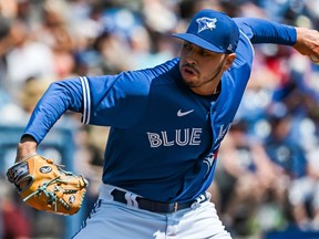 Toronto Blue Jays' Tayler Saucedo pitches against the Pittsburgh Pirates during the third inning of a spring training baseball game at TD Ballpark, Sunday, March 20, 2022, in Dunedin, Fla.