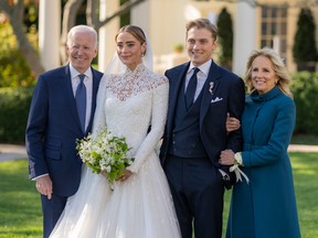 In this handout provided by the White House, President Joe Biden and First Lady Jill Biden attend the wedding of Peter Neal and Naomi Biden Neal on the South Lawn of the White House on November 19, 2022 in Washington.