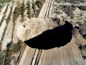 A sinkhole is discovered in a mining area near Tierra Amarilla, in Copiapo, Chile, August 1, 2022.