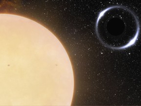 This illustration provided by NOIRLab in November 2022 depicts the closest black hole to Earth and its Sun-like companion star.