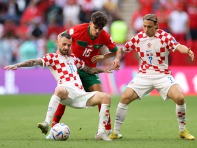 Marcelo Brozovic of Croatia controls the ball against Abde Ez of Morocco during the FIFA World Cup at Al Bayt Stadium on November 23, 2022 in Al Khor, Qatar.