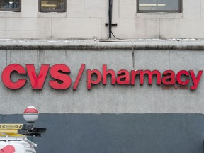 In this file photo taken on January 8, 2018, a CVS store sign in New York.