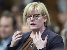 Employment, Workforce Development and Disability inclusion Minister Carla Qualtrough rises during Question Period, in Ottawa on Sept. 29, 2022.