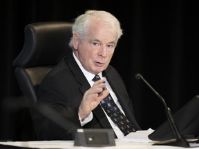Public Order Emergency Commission's Commissioner Paul Rouleau speaks to counsel during a witnesses testimony, Monday, October 31, 2022 in Ottawa.