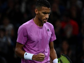 Felix Auger-Aliassime reacts during the men's singles Paris Masters semifinal match against Denmark's Holger Rune at the AccorHotels Arena in Paris on Nov. 5, 2022.