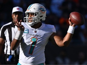 Miami Dolphins quarterback Tua Tagovailoa passes in the third quarter against the Chicago Bears at Soldier Field. Miami defeated Chicago 35-32.