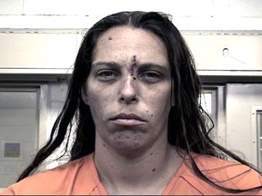 In this booking photo provided by the Metropolitan Detention Center shows Michelle Martens, on April 25, 2016.