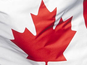 The Canadian flag is seen on a flag pole in Ottawa on June 30, 2020. After months of imploring the federal government to clean up their sport, Canadian gymnasts will finally have the floor in Ottawa.
