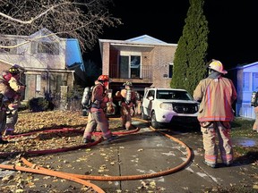 Nine kids and three adults escaped from a house fire on Garden Cr., but one child, 5, had to be rescued from the burning home by firefighters and was rushed to hospital in critical condition on Friday, Nov. 18, 2022.