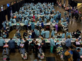 Hundreds of people in need of dental care are treated at the Remote Area Medical mobile clinic at the Tennessee Valley Fairgrounds in Knoxville, Tenn., in 2019.