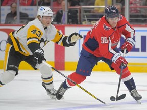 Pittsburgh Penguins left wing Danton Heinen (43), left, chases Washington Capitals right wing Nicolas Aube-Kubel (96) down the ice in the first period during a game between the Washington Capitals and the Pittsburgh Penguins at the Capital One Arena on November 9, 2022 in Washington.