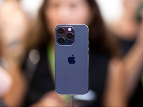 In this file photo taken on Sept. 7, 2022 the new iPhone 14 Pro is displayed during a launch event for new products at Apple Park in Cupertino, Calif.