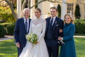 In this handout provided by The White House, President Joe Biden and First Lady Jill Biden attend the wedding of Peter Neal and Naomi Biden Neal on the South Lawn of the White House on Nov. 19, 2022 in Washington D.C.