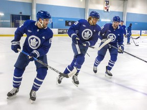 Toronto Maple Leafs  Alexander Kerfoot (from left), William Nylander and John Tavares during practice at the Ford Performance Centre the Etobicoke area of Toronto on Tuesday November 1, 2022.