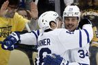 Toronto Maple Leafs right wing Mitch Marner (16) celebrates his goal with center Auston Matthews (34) against the Pittsburgh Penguins during the first period at PPG Paints Arena.