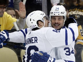 Toronto Maple Leafs right wing Mitch Marner (16) celebrates his goal with center Auston Matthews (34) against the Pittsburgh Penguins during the first period at PPG Paints Arena.