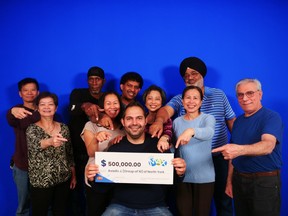 A group of coworkers picked up a big cheque after a Maxmillions win.