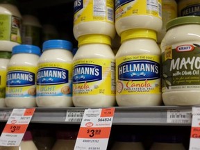 An Arizona couple who started their relationship by chatting over mayonnaise choices at the grocery store were married in that store 10 days ago. Pictured are jars of mayonnaise seen in a store on Jan. 30, 2014 in Miami, Fla.