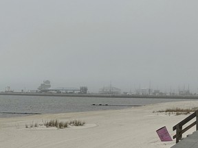 Winter clouds hover over the East Harbor of Pass Christian, Miss., on Tuesday, Nov. 29, 2022.