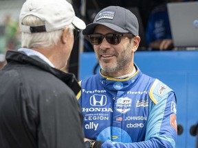 Jimmie Johnson returns to NASCAR as part-owner, driver - Toronto Sun 3 May 27, 2022; Indianapolis, Indiana, USA; Chip Ganassi Racing driver Jimmie Johnson (48) talks with someone in his pit before carb day practice for the 106th Indianapolis 500 at the Indianapolis Motor Speedway.