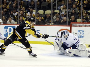 Maple Leafs goaltender Matt Murray makes a save against Pittsburgh Penguins' Jason Zucker during the first period at PPG Paints Arena on Tuesday, Nov. 15, 2022.