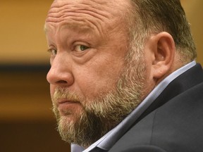 Infowars founder Alex Jones appears in court to testify during the Sandy Hook defamation damages trial at Connecticut Superior Court in Waterbury, Conn., Sept. 22, 2022.