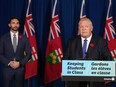 Ontario Premier Doug speaks during a press conference, as Education Minister Stephen Lecce looks on, at Queen's Park in Toronto on Monday Nov. 7, 2022. Ontario is set to repeal legislation today that imposed a contract on education workers and banned their right to strike.