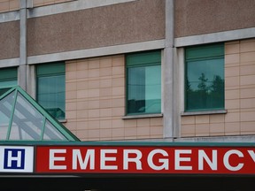 The emergency sign of a Toronto hospital is photographed on Sept. 27, 2022. New data shows there are 122 children in pediatric intensive care units across the province.