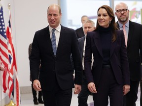 Prince William, Prince of Wales and Catherine, Princess of Wales arrive at Logan International Airport on Nov. 30, 2022 in Boston.