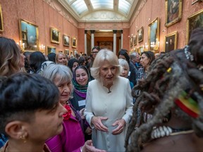 Queen Consort Camilla speaks to guests during a reception to raise awareness of violence against women and girls as part of the UN 16 days of Activism against Gender-Based Violence, at Buckingham Palace in London on Nov. 29, 2022.