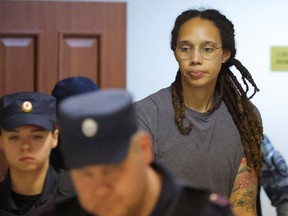 U.S. basketball player Brittney Griner, who was detained at Moscow's Sheremetyevo airport and later charged with illegal possession of cannabis, walks after the court's verdict in Khimki outside Moscow, Russia August 4, 2022.