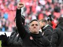 Canada manager John Herdman reacts to fans after a win over Jamaica at BMO Field helped them qualify for the 2022 FIFA World Cup. 