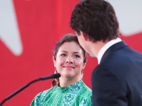 Prime Minister Justin Trudeau, shares a moment with his wife Sophie Gregoire during the Liberal election night party in Montreal September 21, 2021.