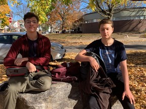 Benjamin Martin (left) and Karl McKinnon, Grade 9 students at Monarch Park Collegiate, say they would not mind mandatory masks coming back. But they prefer not having to wear them in school.