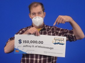 Jeffrey Gurczenski of Mississauga with his OLG cheque.