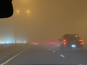Fog limits the view on the eastbound Gardiner Expressway late Thursday, Nov. 3, 2022 in Toronto.