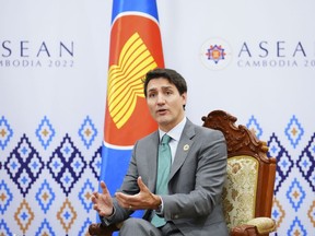 Prime Minister Justin Trudeau takes part in a bilateral meeting with Secretary General of the Association of Southeast Asian Nations Lim Jock Hoi during the ASEAN Summit in Phnom Penh, Cambodia, Sunday, Nov. 13, 2022.