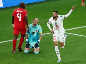 Morocco's Youssef En-Nesyri celebrates scoring their second goal against Canada.