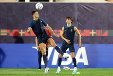 Cristiano Ronaldo of Portugal heads the ball during training.